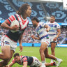 Dom Young scores for the Roosters on Sunday.