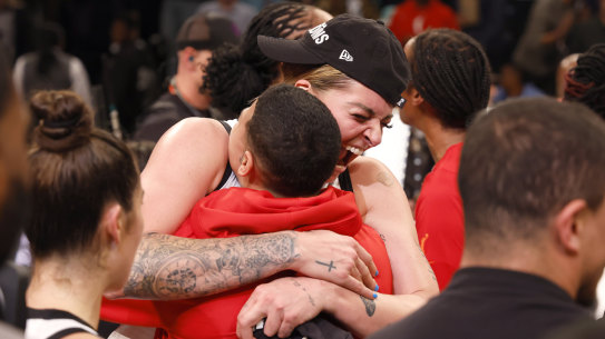 Cayla George celebrates her WNBA championship win with the Las Vegas Aces on Thursday.