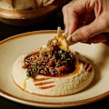 Hummus topped with Fraser Isle spanner crab and Mooloolaba prawns.