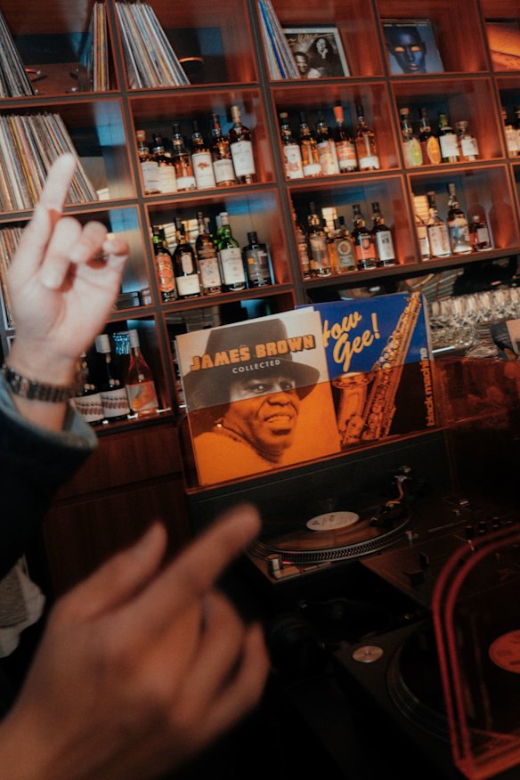 Music shifts from pop to reggae, disco to jazz.