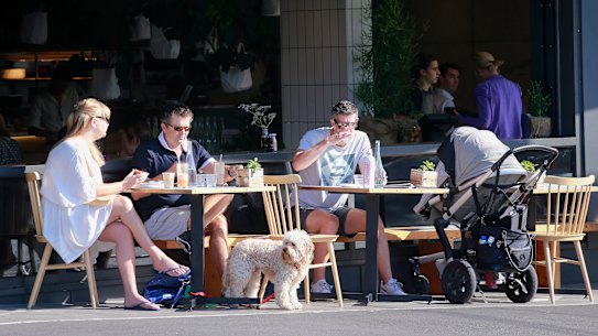 Locals enjoy a coffee in Hampton Street, Hampton.