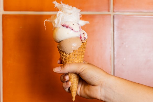 Seasonal gelato topped with fairy floss. 