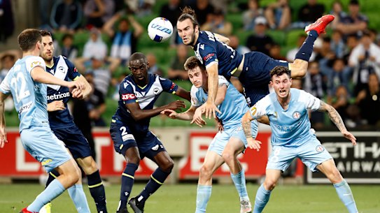 Victory’s Nick D’Agostino attempts to head the ball during the clash with Melbourne City.