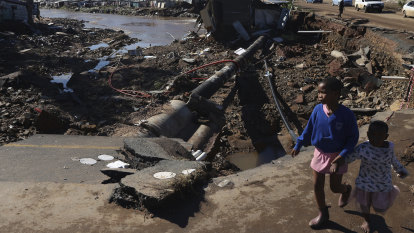 South Africans search for survivors in ruins of floods that killed hundreds