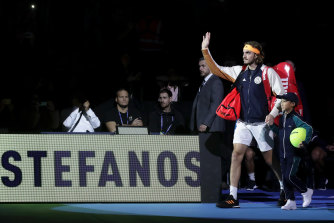 Tsitsipas battles back to win record ATP Finals title