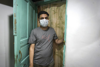 Shahid Nazir Bhat, a Muslim who married Manmeet Kour Bali and was accused by her Sikh parents of kidnapping her, at his home in Srinagar.