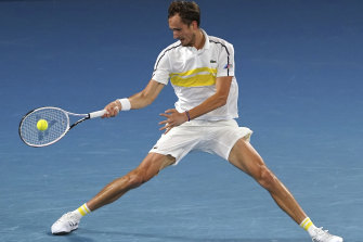 Daniil Medvedev hits a forehand return but was unable to cope with his rival’s play.