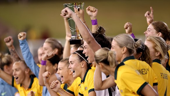 The Matildas lift the Cup of Nations trophy as they continue their preparations for the World Cup.