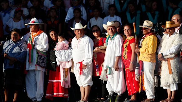 Indigenous religious leaders wait for Mexico's new President Andres Manuel Lopez Obrador for a traditional indigenous ceremony at the Zocalo, in Mexico City, on Saturday.