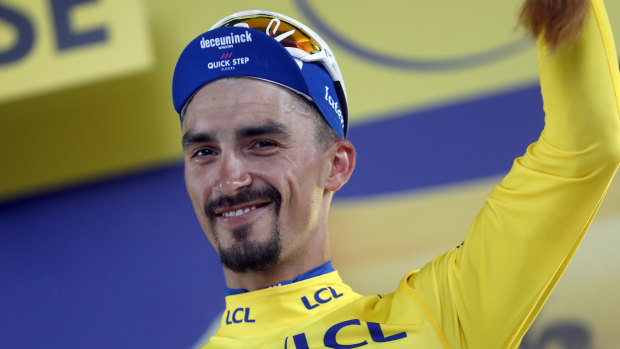 France's Julian Alaphilippe retained the overall leader's yellow jersey.