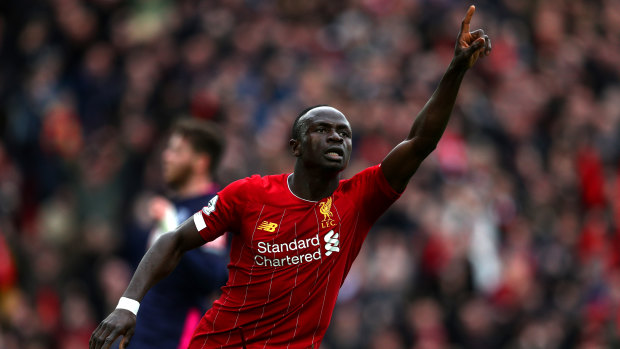 Sadio Mane celebrates after scoring Liverpool's second goal against AFC Bournemouth  at Anfield.