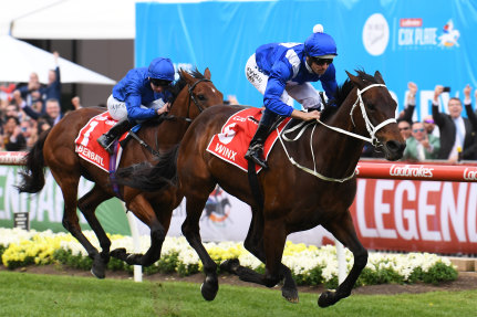 Simply the best: Winx cruises away from Benbatl to take her fourth Cox Plate in October.