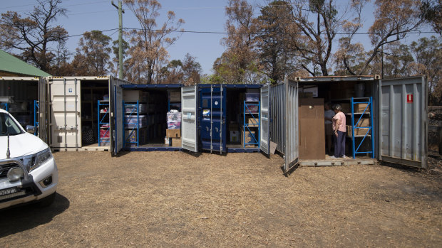 Donations stored at the Balmoral Village Hall have overflowed into seven shipping containers. Emergency services are asking the public to give money, not goods. 