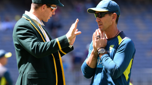 Brains trust: Tim Paine and coach Justin Langer.