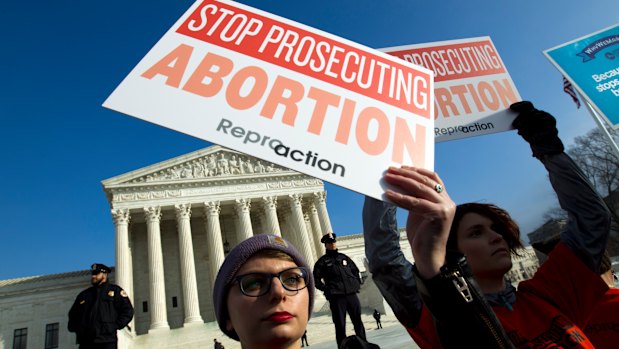 Abortion rights activists protest at the US Supreme Court during the March for Life in Washington. 