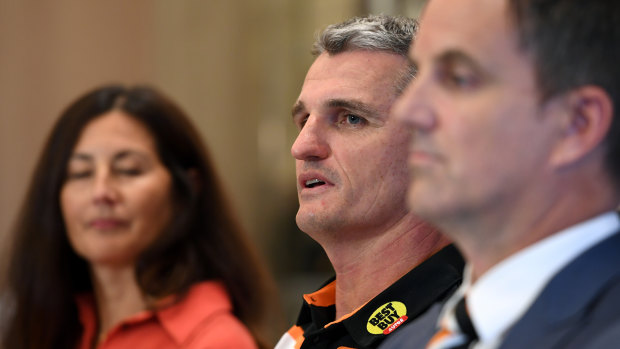 Playing hard ball: West Tigers chief Justin Pascoe (front) will fight to keep Ivan Cleary (centre).