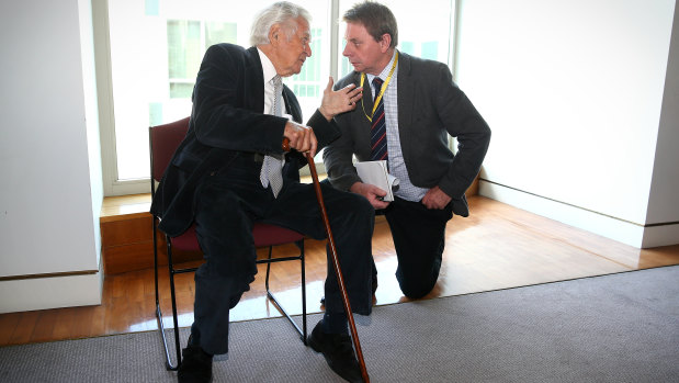 Former prime minister Bob Hawke talks with Tony Wright during a book launch at Parliament House in 2016.