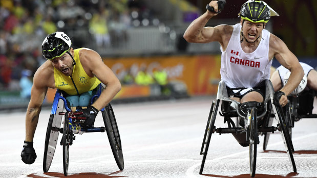 Canadian Alexander Dupont and Kurt Fearnley cross the finish line.