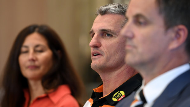 Getting off the bus? West Tigers chair Marina Go with Ivan Cleary.