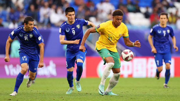 Australia’s Kusini Yengi in action against Uzbekistan.