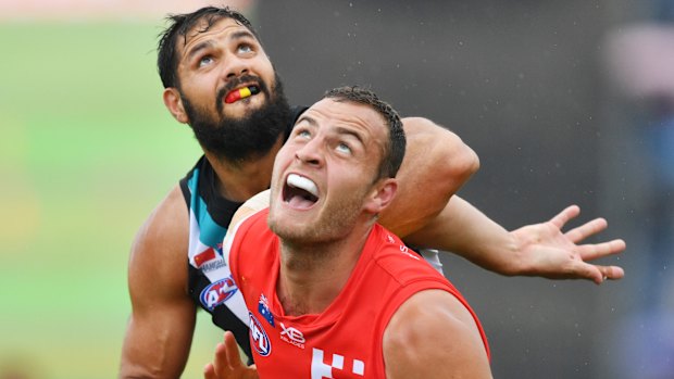 Jarrod Witts battles with Paddy Ryder in China last year.