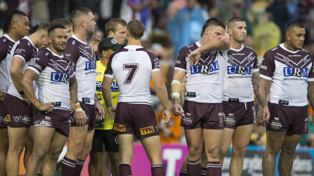 Rallying the troops: Manly's Daly Cherry-Evans speaks to teammates during their match against Wests Tigers.