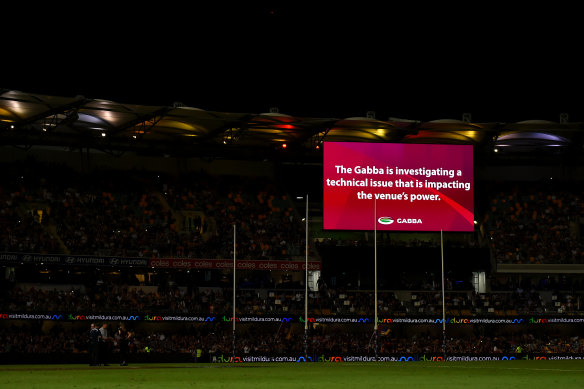 A power outage halted play at the Gabba.