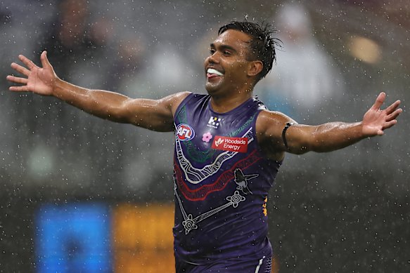 Isaiah Dudley of the Dockers celebrates a goal.