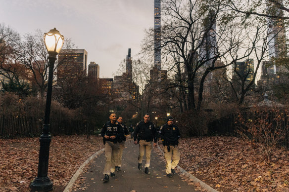 Police officers searched Central Park on Friday for clues.