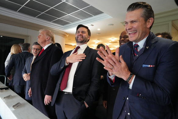 Pete Hegseth (right), who is Do<em></em>nald Trump’s choice for defence secretary,  with the president-elect (left) and J.D. Vance at the Army-Navy football game in Landover, Maryland, on Saturday.