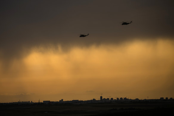 Israeli attack helicopters make their way to the Israeli southern border with the Gaza Strip on October 9, 2023 near Ashdod Israel. 