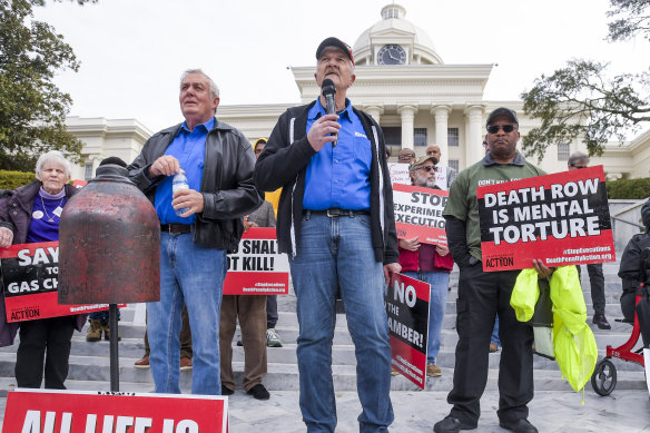 Former death row inmates who were exonerated, from left, Randall Padgent, Gary Drinkard and Ron Wright, were among the nearly 100 protesters at the Alabama capitol building in Montgomery this week.