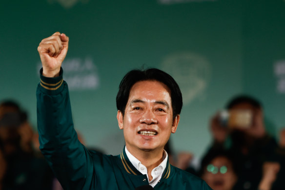 Taiwan’s next president Lai Ching-te celebrates his victory on Saturday. 