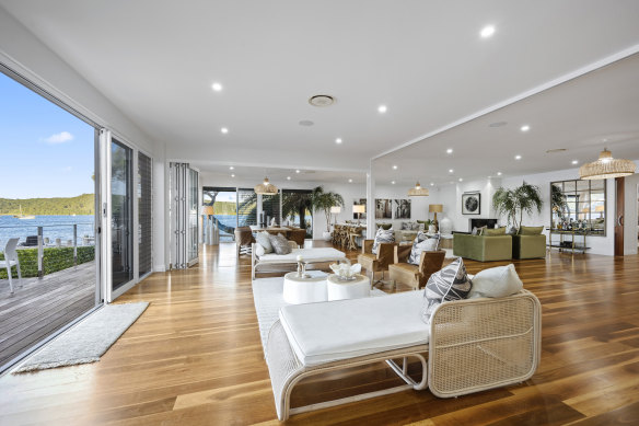 The three-bedroom residence is set on a waterfront parcel of 2244 square metres.