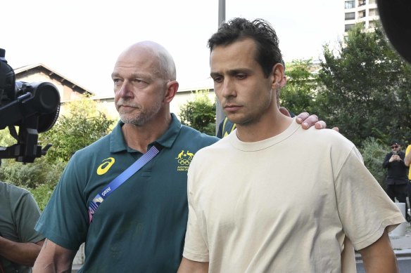 Tom Craig (right) after his release from police custody in Paris.