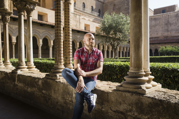 Francesco Lepore, a Latin expert, gay rights activist, journalist and former Catholic priest, at the Benedictine Cloister in Monreale, Italy.