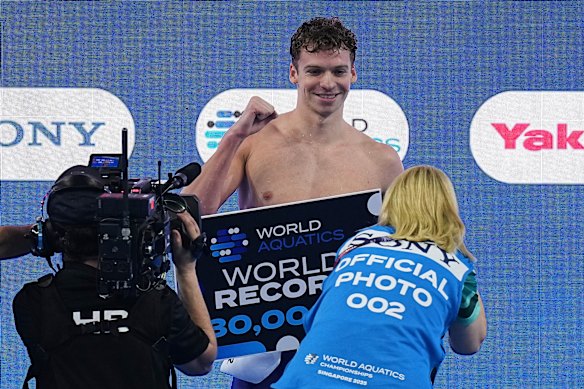 France’s Leon Marchand receives a cheque for US$30,000 (approximately AU$44,400) for breaking the 200m individual medley world record. 