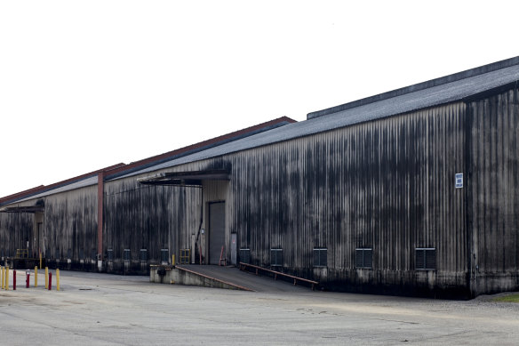 A Brown-Forman whiskey ageing warehouse coated in Baudoinia, a type of fungus that germinates off ethanol, in Louisville, Kentucky, in 2012. 