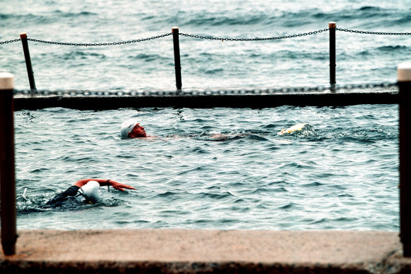 Early morning swimmers at Newport Beach rock pool.