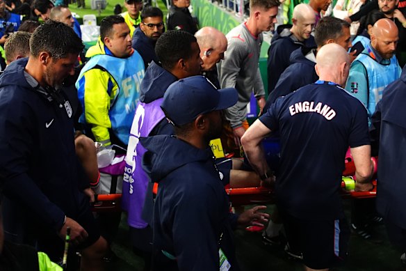 Jordan Henderson has been carried off on a stretcher after suffering a wrist injury after the England match.
