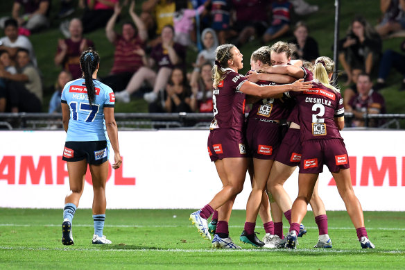 The Maroons weathered a late Blues fightback to score an emotional win.