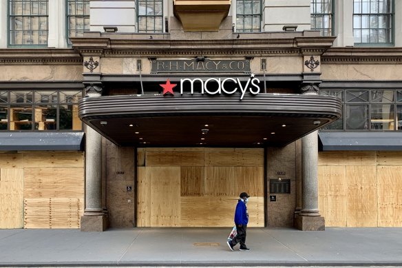 Macy's in Herald Square in Manhattan is boarded up after looters ransacked the department store the previous night.