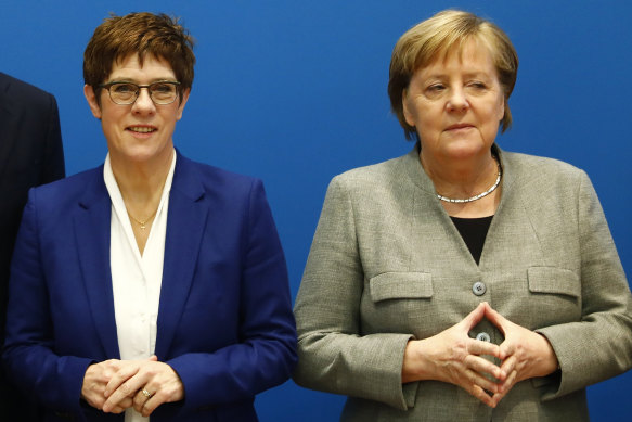 Annegret Kramp-Karrenbauer, left, is a protegee of Chancellor Angela Merkel.