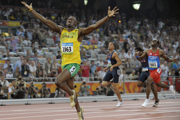 Usain Bolt celebrates as he wins the men’s 200-metre final  at the Beijing Olympics in 2008.