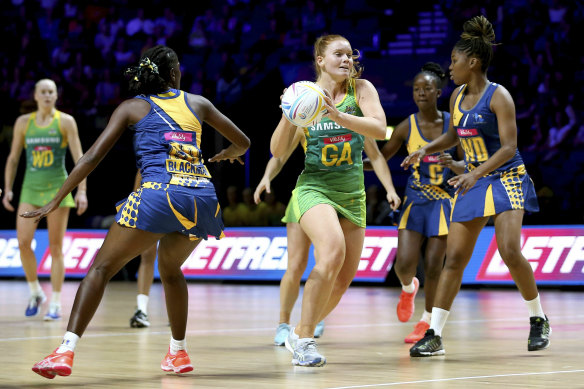 Steph Wood (centre), pictured here in action at last year's Netball World Cup, was crucial in the Lightning's win.