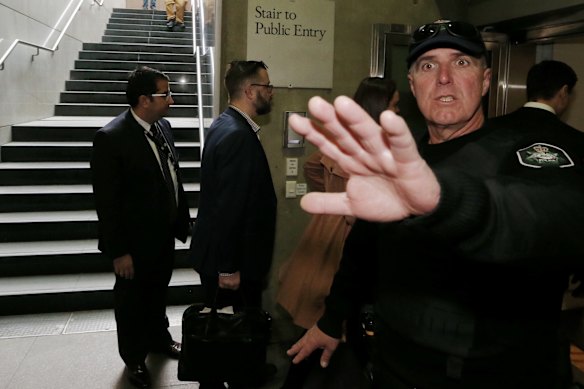 Staff arrive during police raids on federal parliamentary offices in 2016.