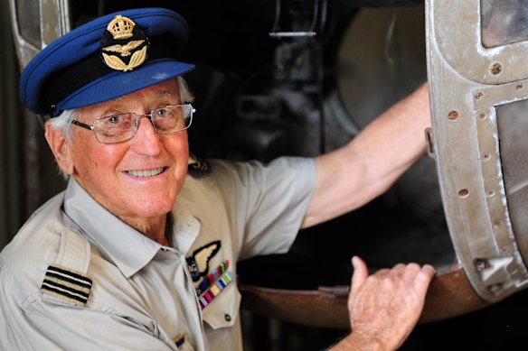 Brian Winspear checks a bomber gun turret. He flew as a gunner in Hudson bombers from the Northern Territory.