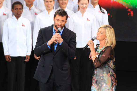 Hugh Jackman and Olivia Newton-John at Oprah Winfrey’s ‘Ultimate Australian Adventure’ in 2010