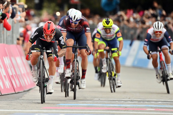 Caleb Ewan (left) sprints to victory in stage seven of the Giro d’Italia.