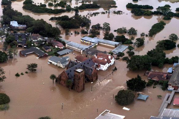 Inundated, isolated, in despair: Floodwaters around Lismore’s St Carthage’s Cathedral and Trinity Catholic College.